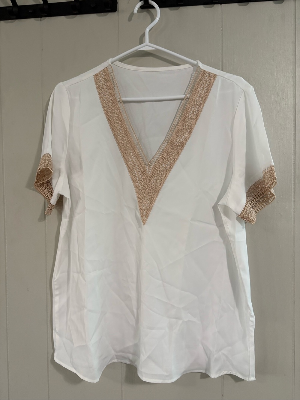 White V-Neck Blouse with Tan Crochet Trim